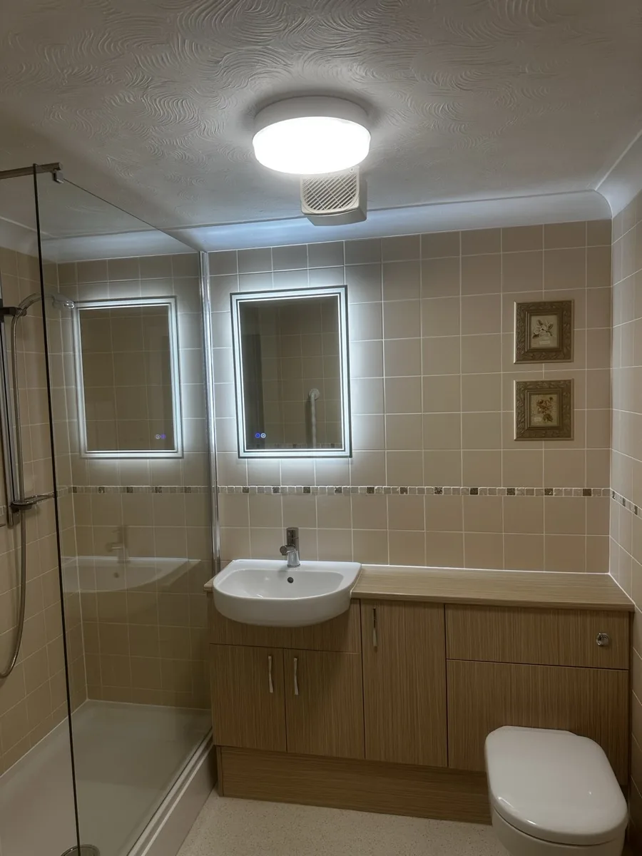 Bathroom LED mirror and zone-rated lighting