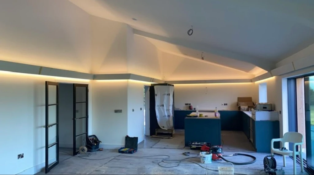 LED cove lighting in vaulted kitchen ceiling by DS Electrical