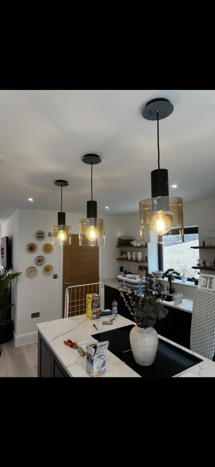 Modern kitchen with pendant lights